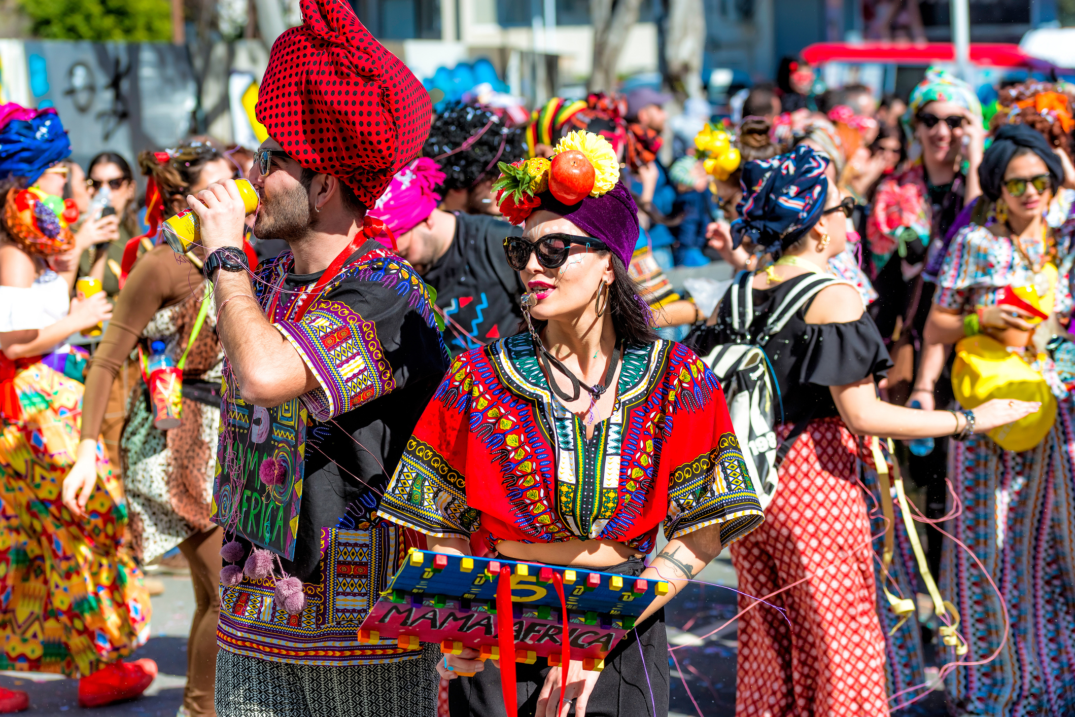 People in colorful costumes during the famous annual Grand Carnival Parade - Limassol, Cyprus - March 01, 2020.
