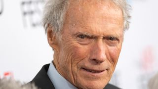 Clint Eastwood on red carpet, image via Getty.