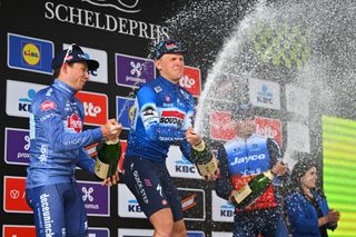 Tim Merlier celebrated his Scheldeprijs 2024 victory alongside Jasper Philipsen and Dylan Groenewegen.