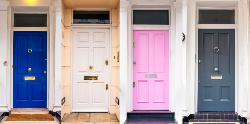 A high resolution composite image of six door entrances to multiple apartment properties in London, England.