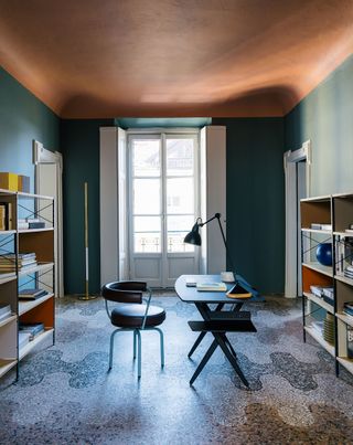 A home office with ceiling paint