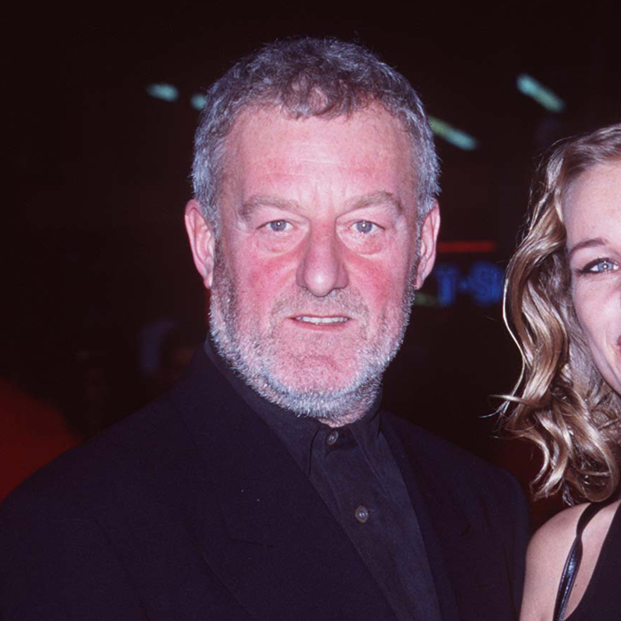 Bernard Hill attends the premiere of Titanic in Hollywood, California