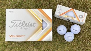 Titleist Velocity 2023 Golf Balls showing off their excellent casing and their cool yellow and white packaging