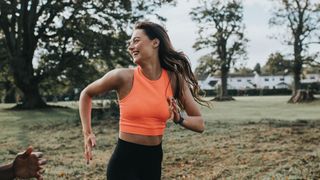 woman running in the park to boost her mood
