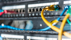 Yellow and blue wires wired into a Metinteractive device.