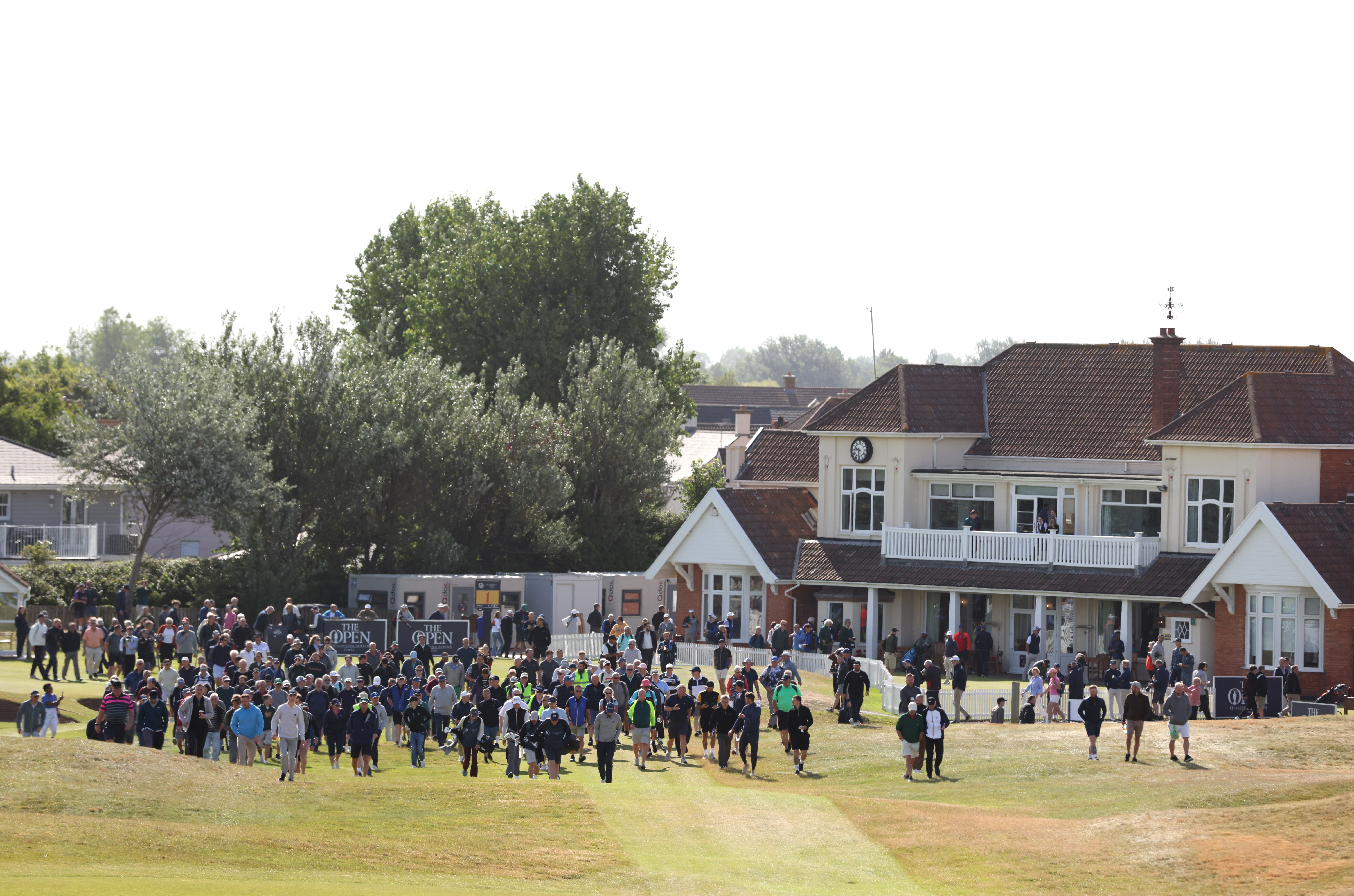 Fans at Burnham and Berrow walk down the fairway