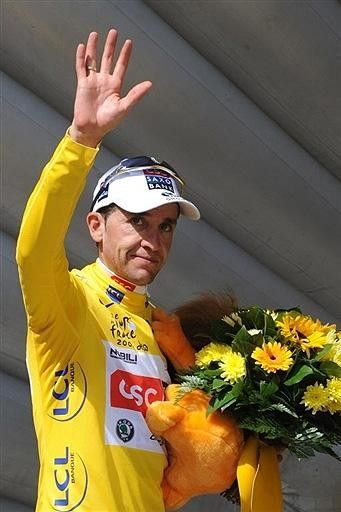 A nervous wave from Carlos Sastre whose mind is most likely focused on Saturday's race deciding time trial.
