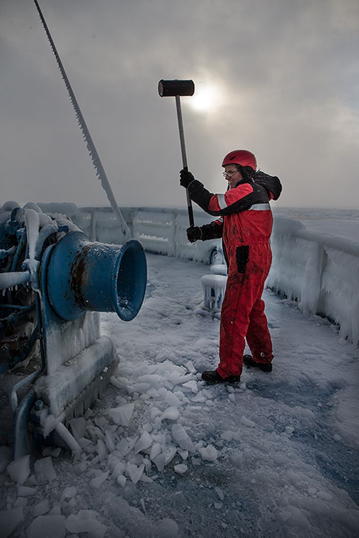 Breaking ice off icebreaker vessel, Svalbard expedition