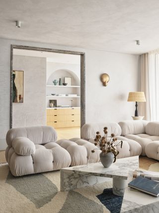 A living room with a Camaleonda sofa
