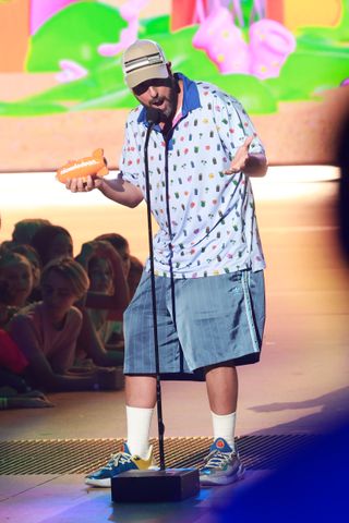 Adam Sandler on stage at the Nickelodeon Kids' Choice Awards.