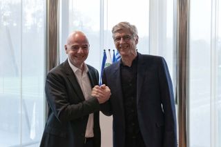 Wenger, right, with FIFA president Gianni Infantino