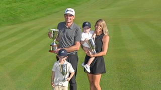 Keegan Bradley with his wife Jillian and their two children after winning the 2023 Travelers Championship