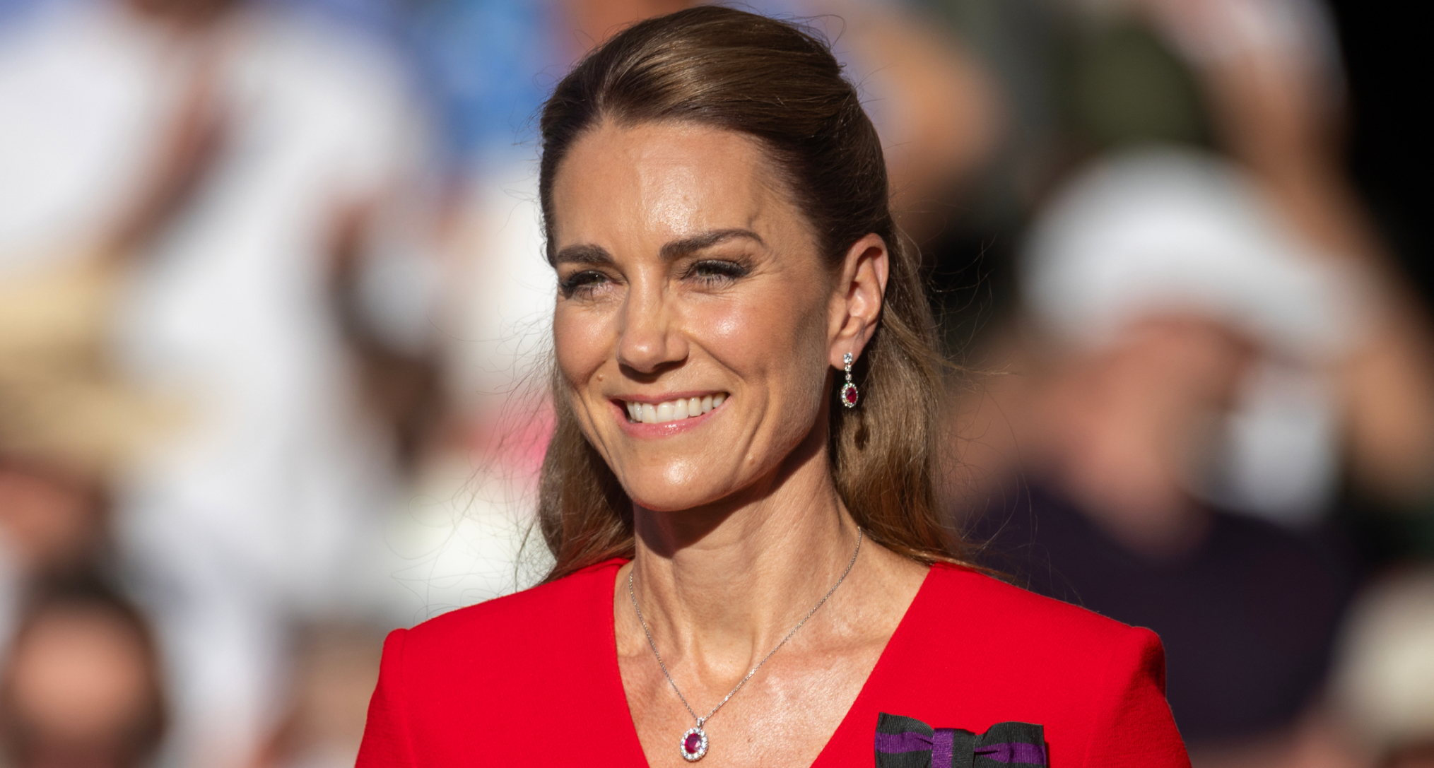 Princess Kate wearing a red dress and ruby jewelry at Wimbledon
