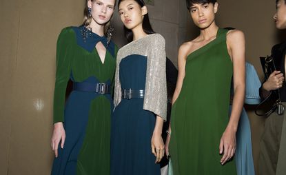 Models wear green and blue dresses at Givenchy S/S 2019