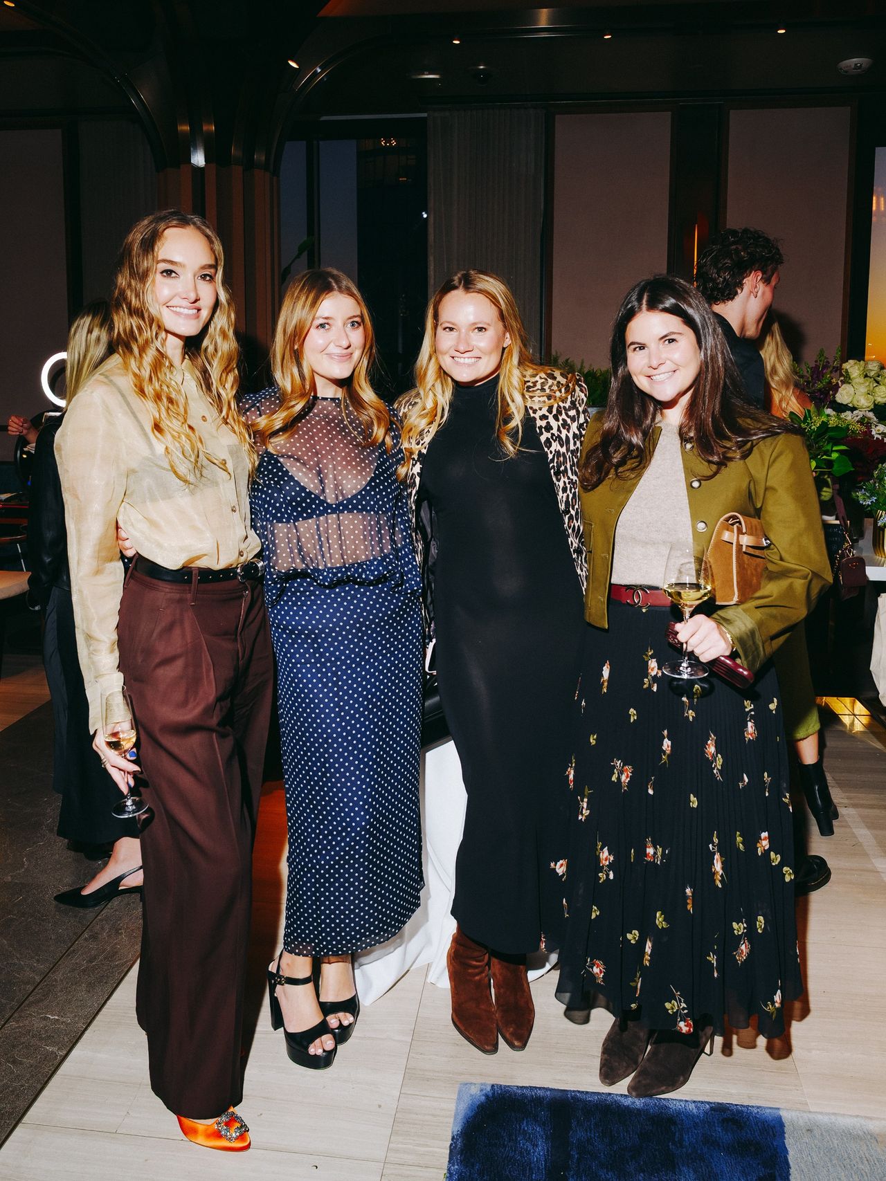 four women at a party in NYC