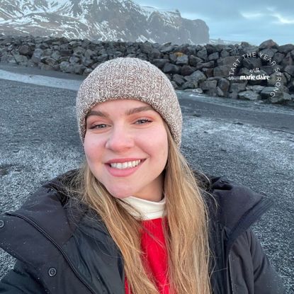 valeza smiling in a wintery scene after having tried and tested wellness products