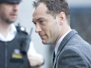 Jude Law arrives to give evidence during phone-hacking trial