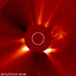 The Sun released one of the fastest and largest CMEs ever recorded (the giant cloud on the right of this image) on 22 July 2012. The glare of the Sun is blocked out by a coronagraph.