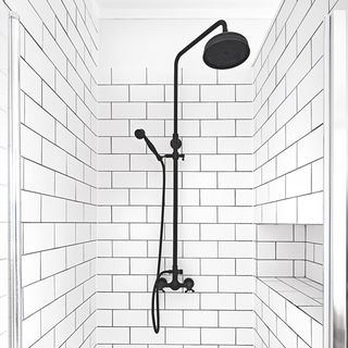 bathroom with white grout tiles metro tiles