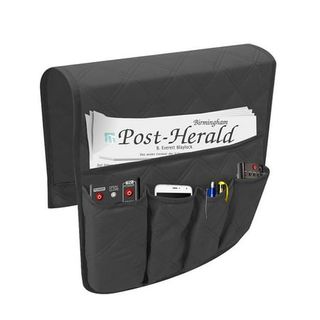 A black fabric armrest organzier with four long pockets and one large A4 pocket