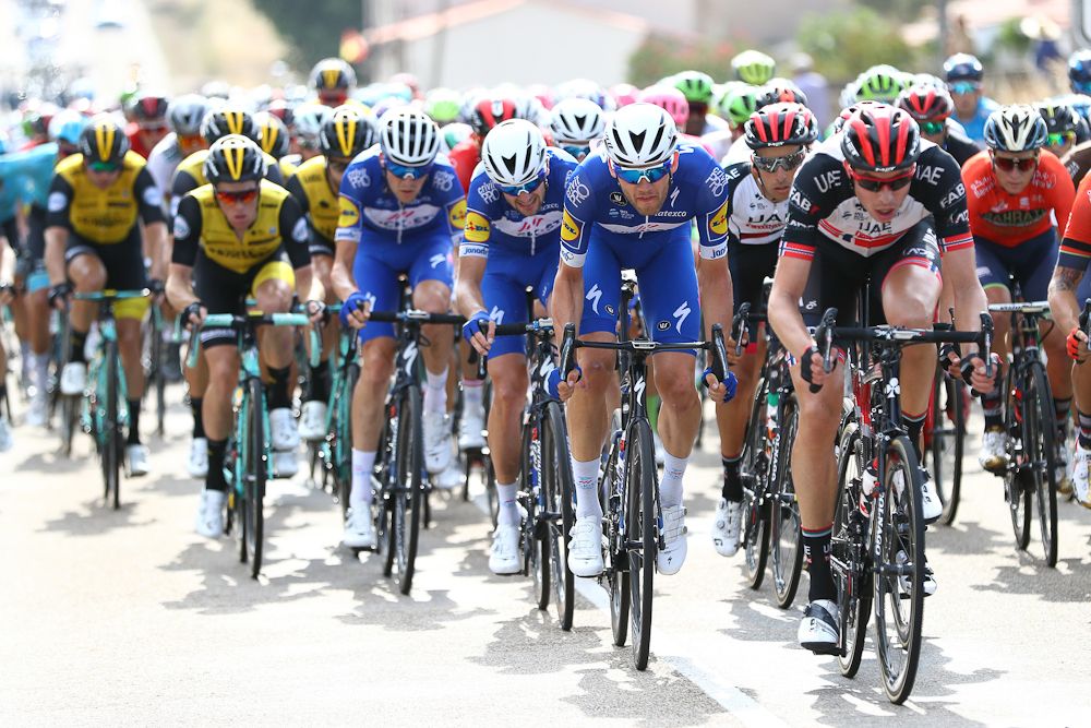 Sprint teams line up on the front near the end of stage 10 at the Vuelta
