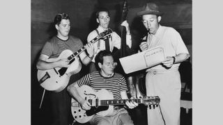 The Les Paul Trio with Bing Crosby in 1945. Crosby is holding the sheet music for the song “Whose Dream Are You,” which appeared on the flipside of his 1945 hit with the trio, “It’s Been a Long Long TIme.”
