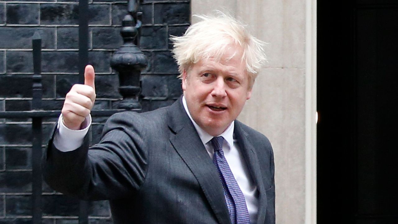 Boris Johnson give a thumbs-up gestures as he greets Abu Dhabi&amp;#039;s Crown Prince Sheikh Mohammed bin Zayed al-Nahyan.