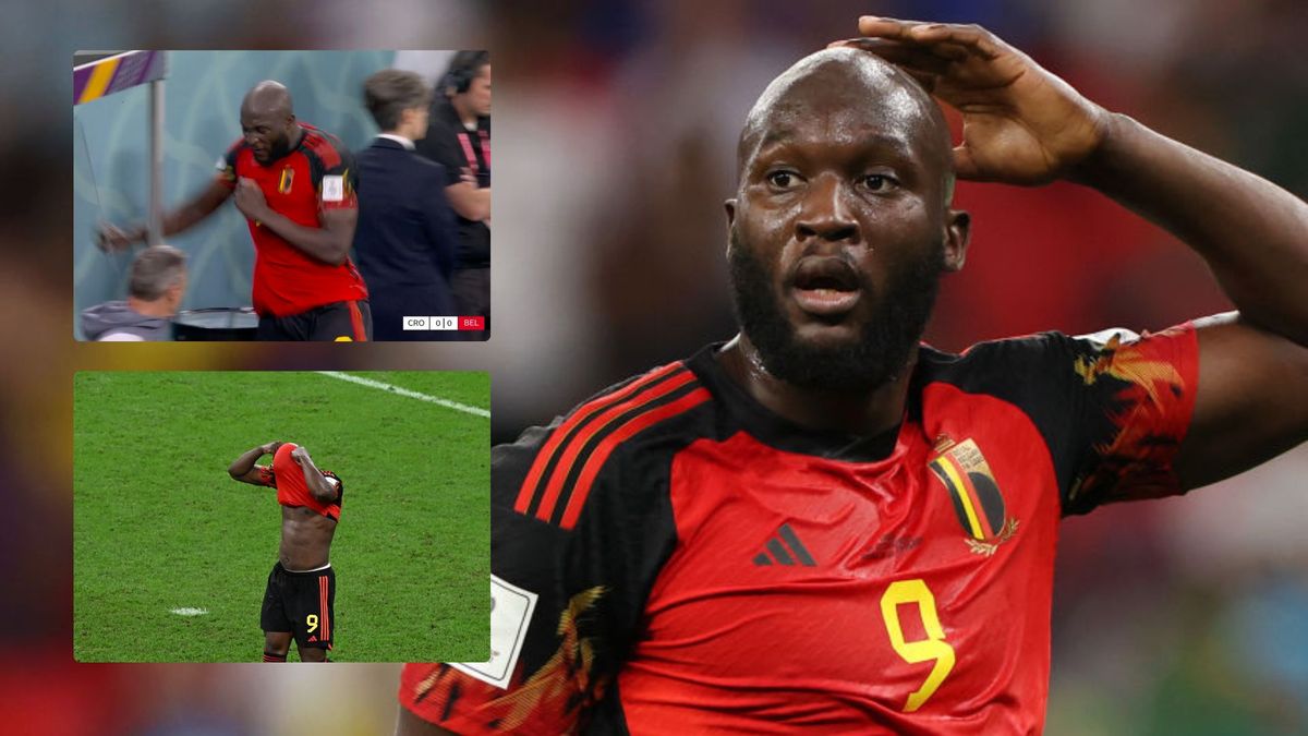 Romelu Lukaku punches glass out of the dugout after missing four clear chances to put Belgium through