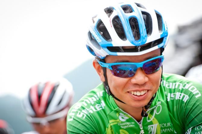 The race leader Taiji Nishitani (Aisan Racing) smiling at the start line