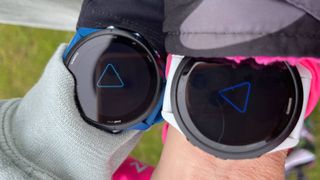 Garmin Forerunners in boot-up screens worn on two wrists