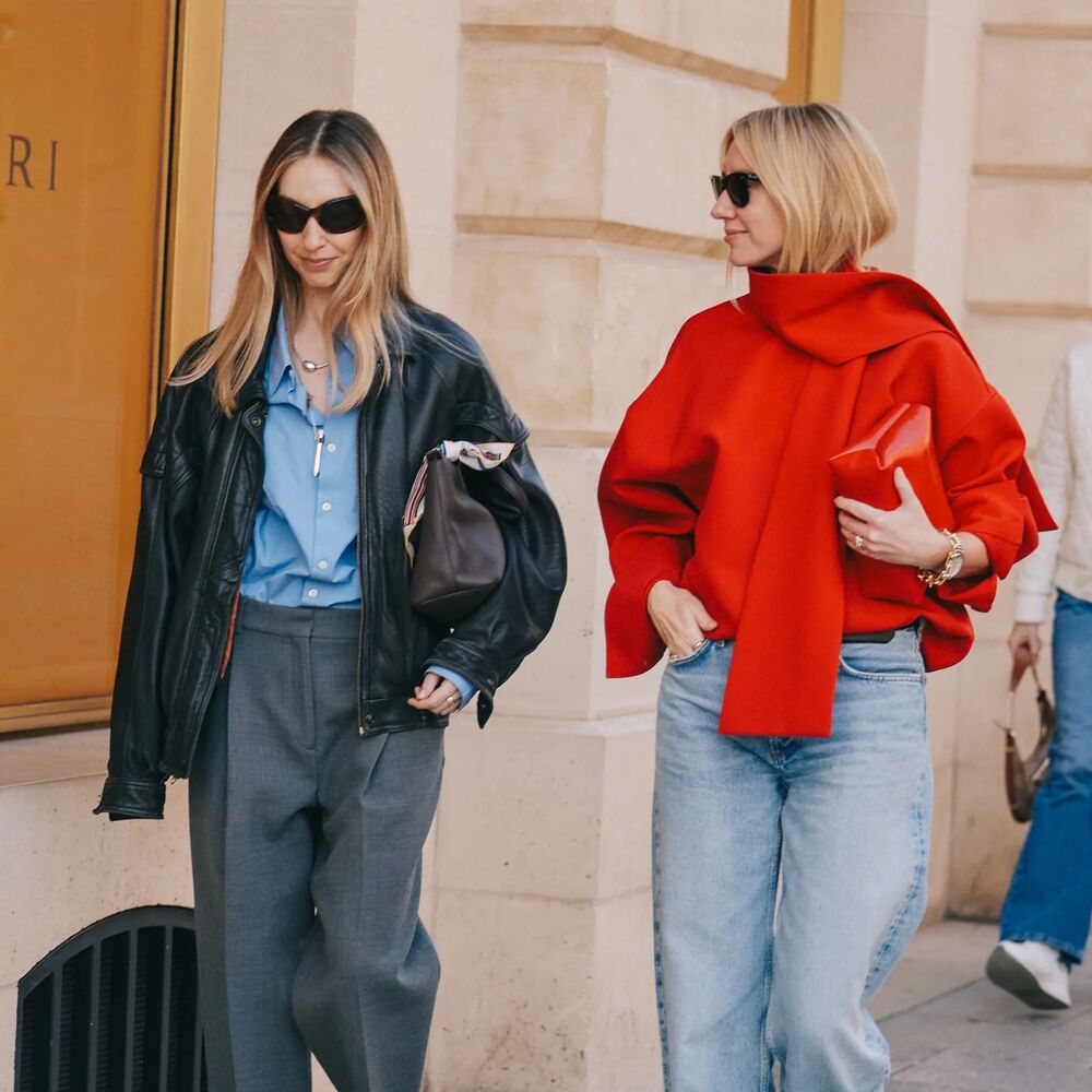 Two woman walking at Paris Fashion Week