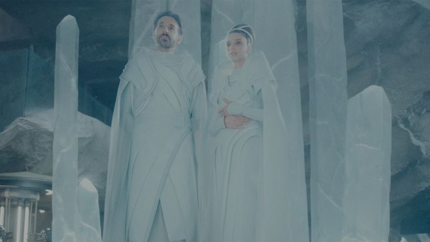 Angela Sarafyan and Bradley Cooper as Lara Lor-van and Jor-El in Superman