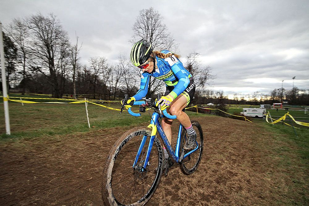 Natasha Elliott (Garneau-Easton) concentrates on pulling through the mud.