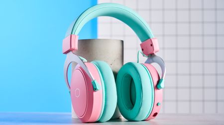 A pink and teal Cooler Master CH351 wireless gaming headset