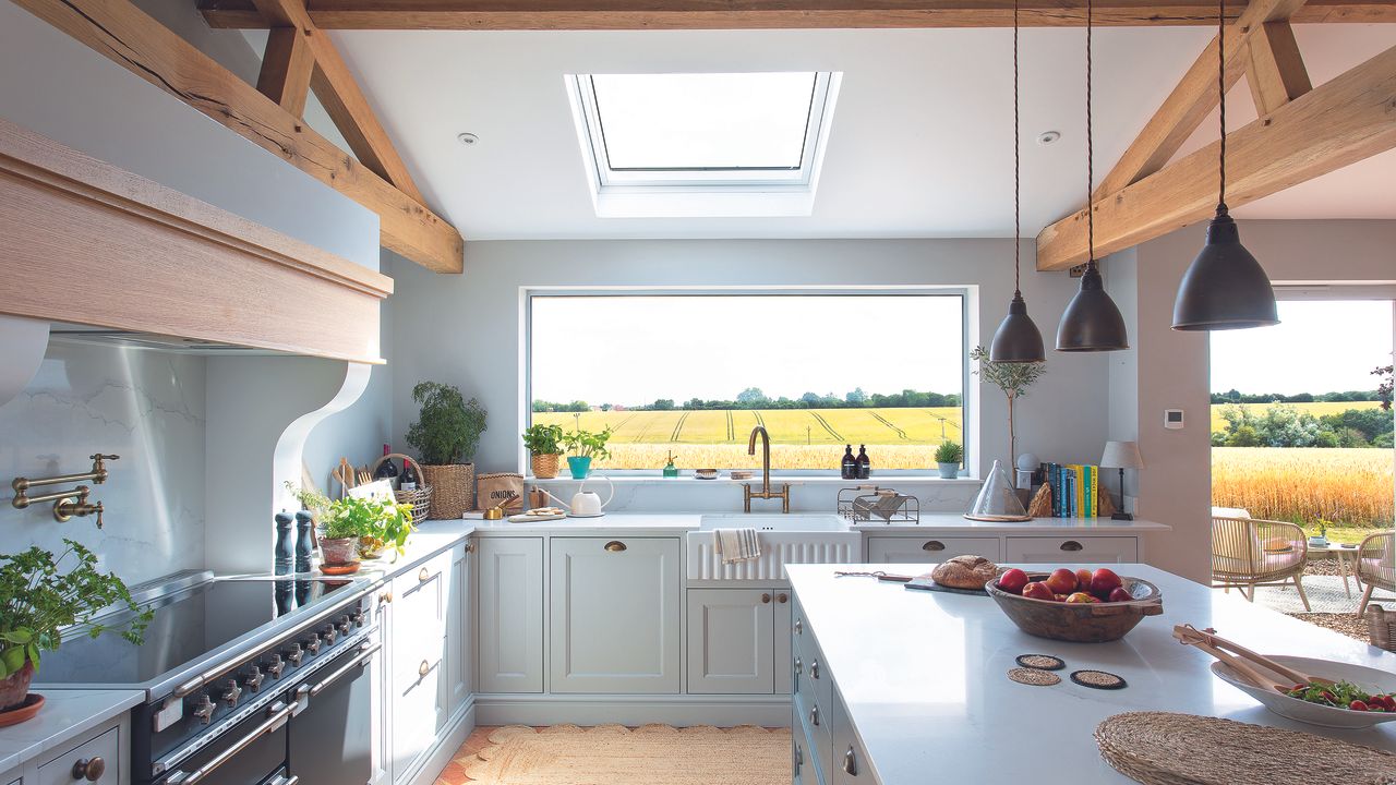 Shaker kitchen in barn conversion overlooking fields