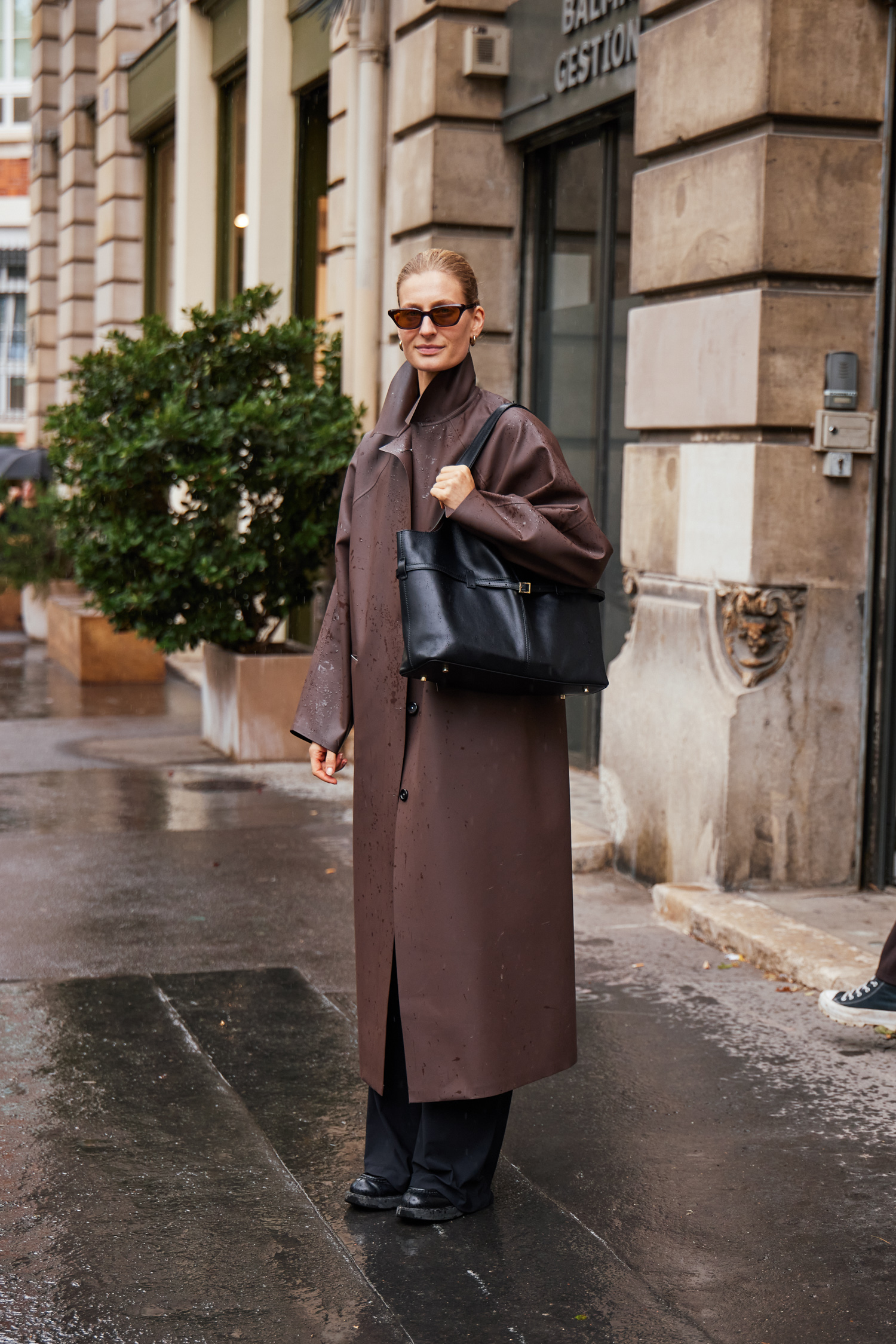 A Paris Fashion Week attendee shows off their outfit.