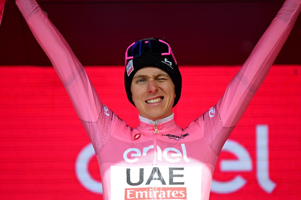 PRATI DI TIVO ITALY MAY 11 Tadej Pogacar of Slovenia and UAE Team Emirates celebrates at podium as Pink Leader Jersey winner during the 107th Giro dItalia 2024 Stage 8 a 152km stage from Spoleto to Prati di Tivo 1451m UCIWT on May 11 2024 in Prati di Tivo Italy Photo by Dario BelingheriGetty Images