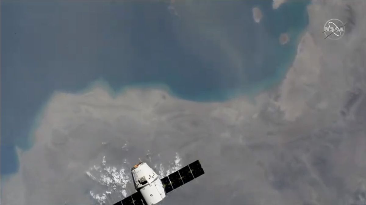 A previously flown Dragon cargo ship arrives at the International Space Station carrying 5,000 lbs. of supplies on the CRS-18 mission for NASA on July 27, 2019.
