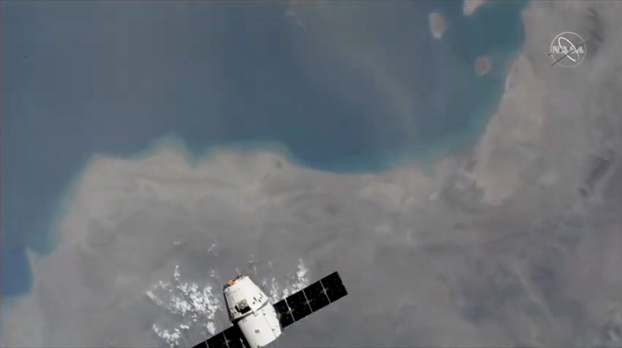 A previously flown Dragon cargo ship arrives at the International Space Station carrying 5,000 lbs. of supplies on the CRS-18 mission for NASA on July 27, 2019.