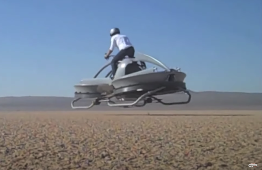 A rider tests an Aerofex hoverbike in the Mojave desert.