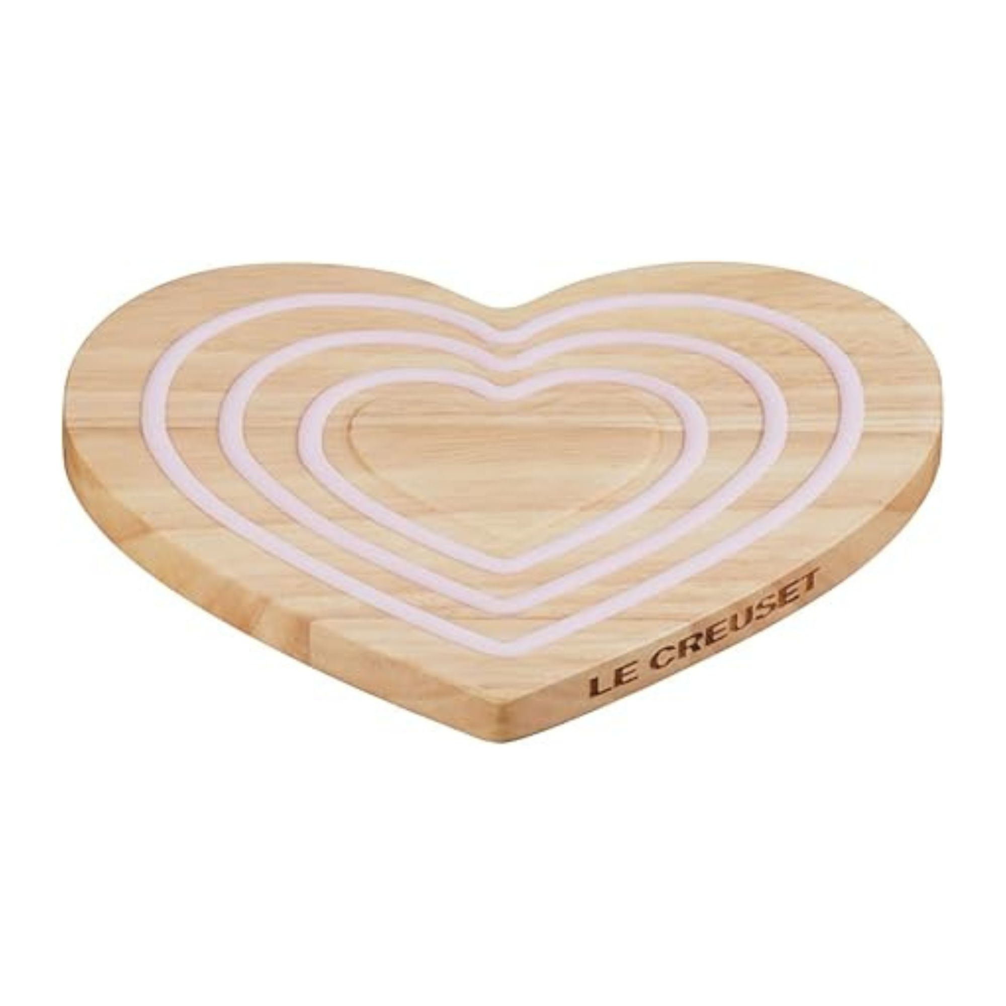 A wooden heart shaped trivet