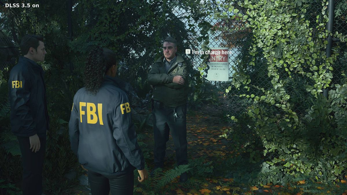 Alan Wake 2 screenshot with Ray Reconstruction on next to NPC