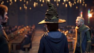 Hogwarts Legacy trailer - A young wizard has the sorting hat on in the main hall at Hogwarts