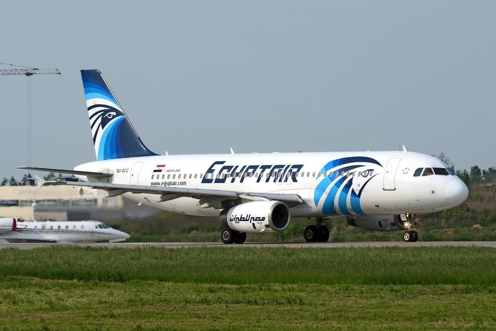 gyptair AIrbus A320 SU-GCC slowing down on runway at Domodedovo International airport in 2011.