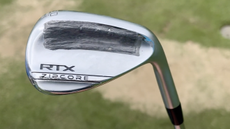 Lead tape on the back of Patrick Reed's wedge