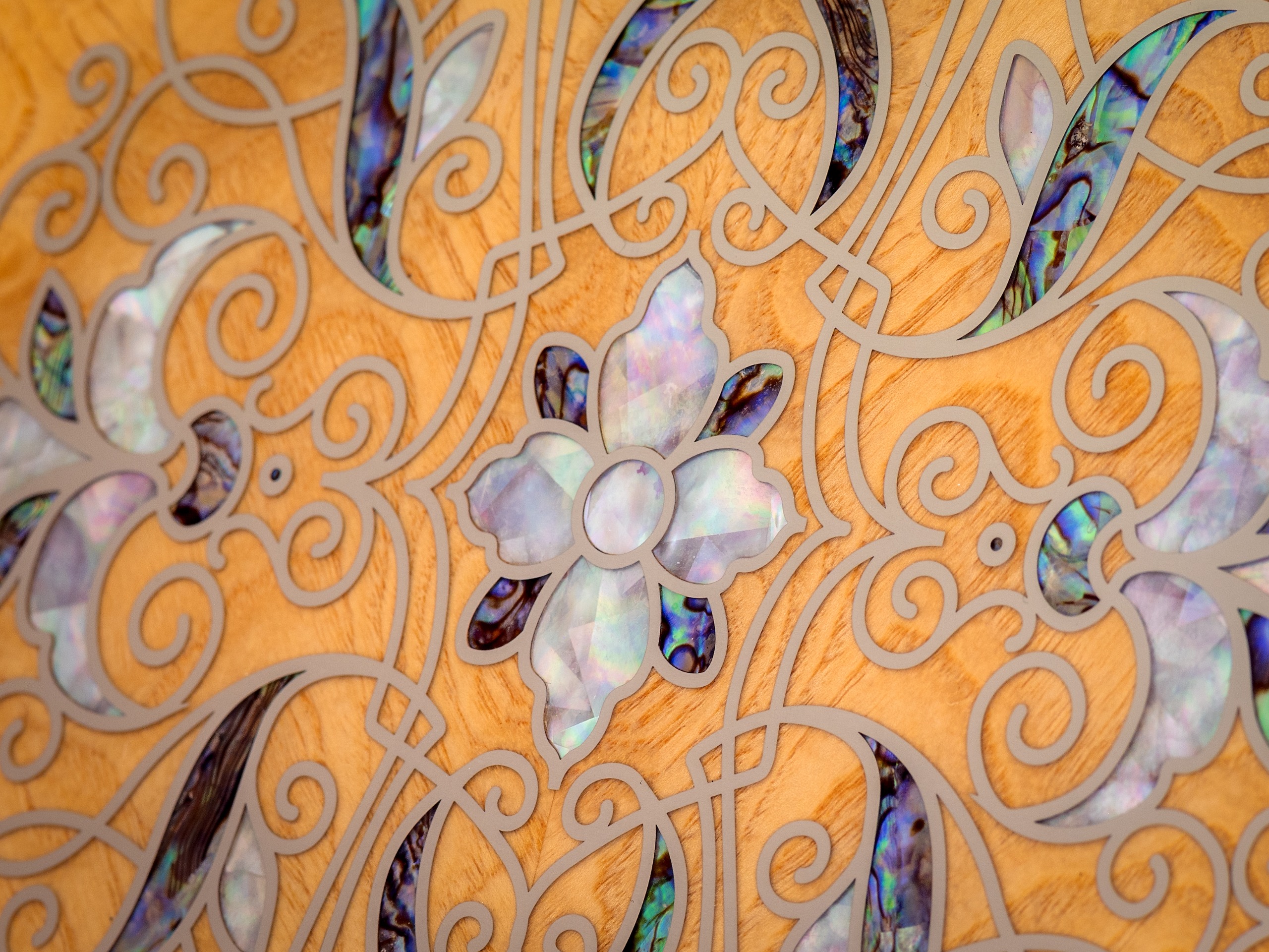 Detail of the floral motif in abalone and mother-of-pearl