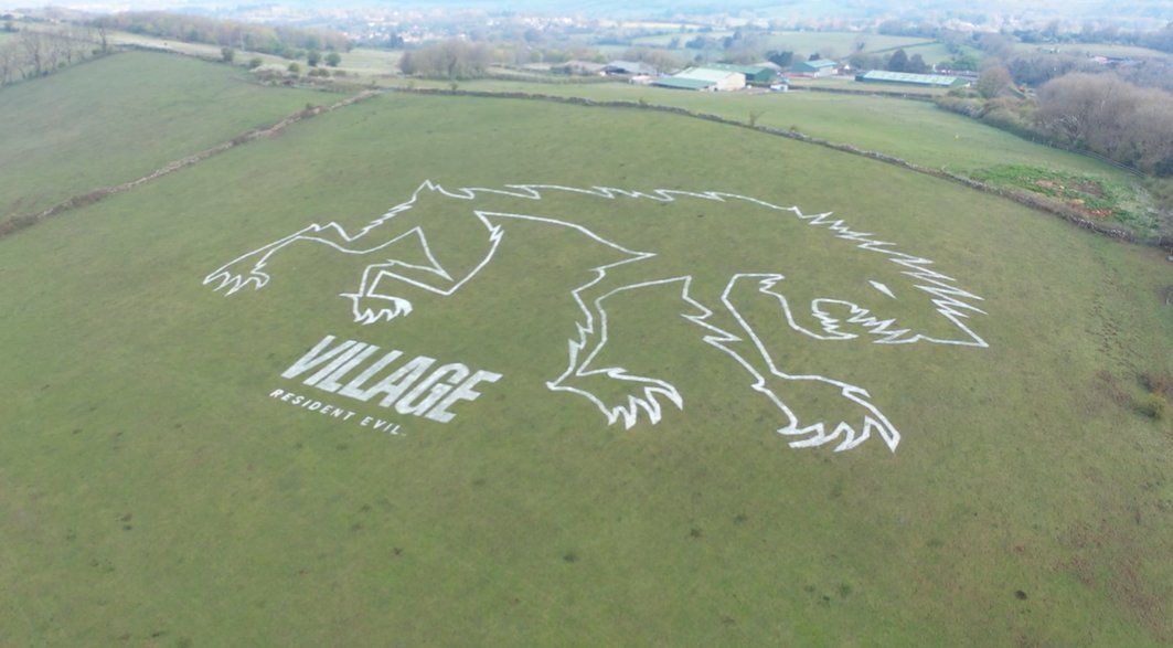 The white outline of a stylised Lycan dominates this Somerset hillside