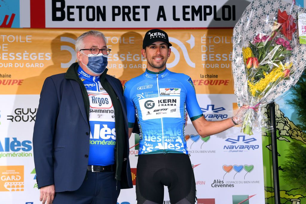 ROUSSON FRANCE FEBRUARY 03 Mart Mrquez Roman of Spain and Team Equipo Kern Pharma celebrates winning the blue mountain jersey on the podium ceremony after the 52nd toile De Bessges Tour Du Gard 2022 Stage 2 a 156km stage from SaintChristollesAls to Rousson 304m EtoiledeBesseges EDB2022 on February 03 2022 in Rousson France Photo by Luc ClaessenGetty Images