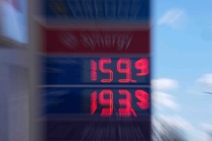 Energy crisis concept: Fuel prices are displayed at a petrol station