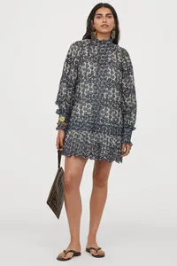 Eyelet embroidery dress, $99 | H&amp;M x Sabyasachi
